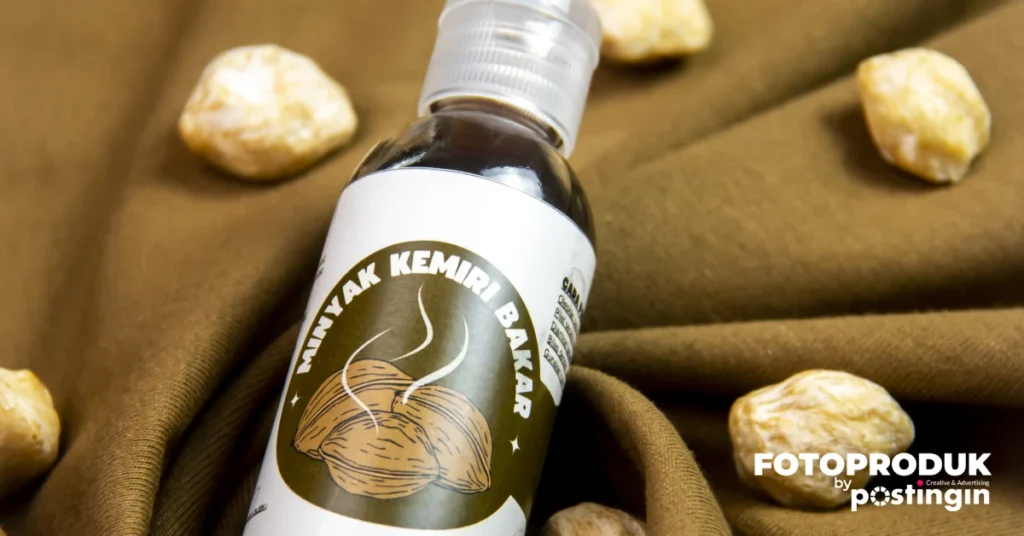 foto produk minyak kemiri botol by Postingin